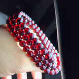 Natural Wine Red Garnet Three Ring Bracelet, with beads approximately 5.6 to 5.7mm in diameter2610169354