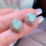 Pure natural dazzling white opal earrings, with a main stone size of 6 * 8mm1115140233