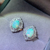 Pure natural dazzling white opal earrings, with a main stone size of 6 * 8mm1115140233