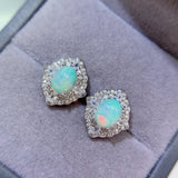 Pure natural dazzling white opal earrings, with a main stone size of 6 * 8mm1115140233